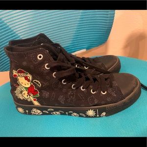 Hello kitty canvas tattoo style shoes. Crossover chuck taylor style shoes